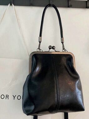 Classic Black Leather Frame-Top Handbag